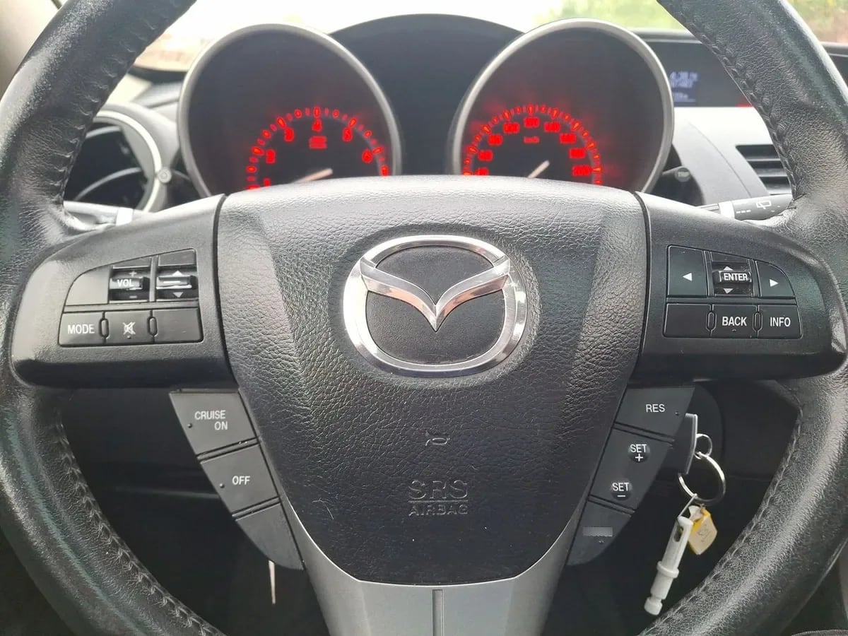 Mazda 3 2.0 Sport R 4x2 Te Mt 5p año 2011