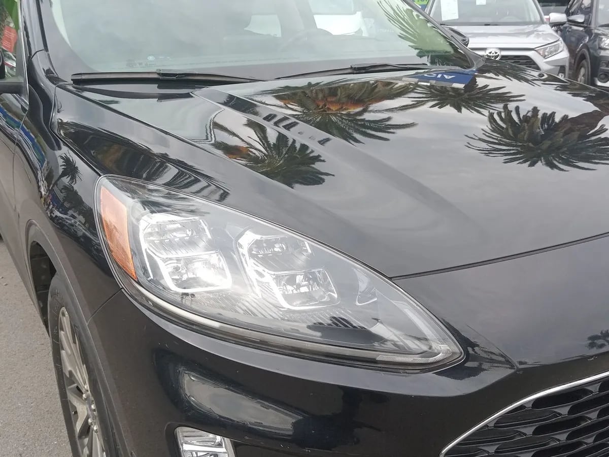 Ford Escape 2.5 Atkinson Titanium Hibrido Awd At 5p año 2021